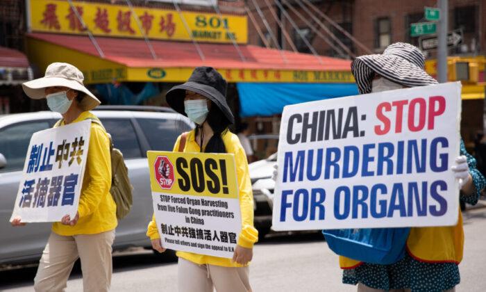 Последователи Фалуньгун на параде в честь 22-й годовщины преследования Фалуньгун в Китае, Бруклин, штат Нью-Йорк, 18 июля 2021 года. Фото: The Epoch Times/Chung I Ho
 | Epoch Times Media