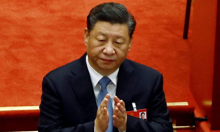 Китайский лидер Си Цзиньпин на открытии Всекитайского собрания народных представителей (ВСНП) в Большом зале народных собраний в Пекине, Китай, 5 марта 2022 года. Изображене: Carlos Garcia Rawlins/Reuters | Epoch Times Media